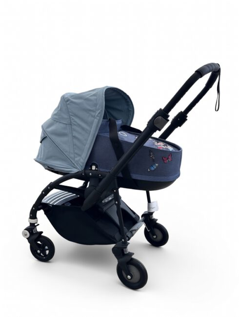 צבע עגלה: בוגבו בי - מרכב: דיזל | עריסה ובד מושב: כחול מלאנג' בוטאניק | גגון: כחול ופור